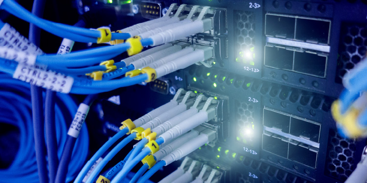 Fiber-optic network cables carrying high-speed internet signals. modern networking technology